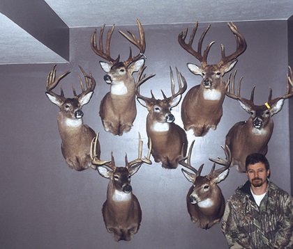 marc anthony posing with deer